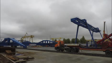 industrial area with cranes and heavy equipment