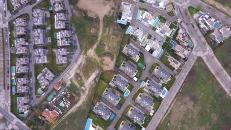 drone rotation revealing luxury modern semi-detached chalets