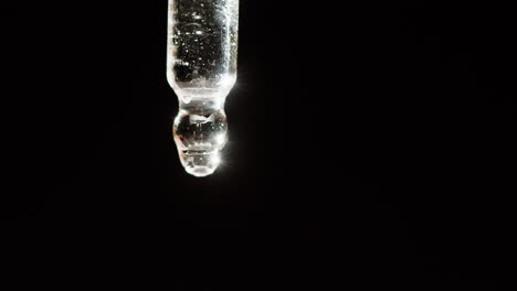 close-up of a glass dropper bottle