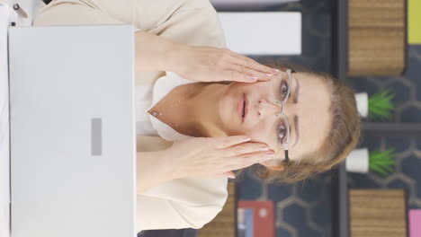 Vertical-video-of-Business-woman-looking-at-his-wrinkled-and-rough-skin.