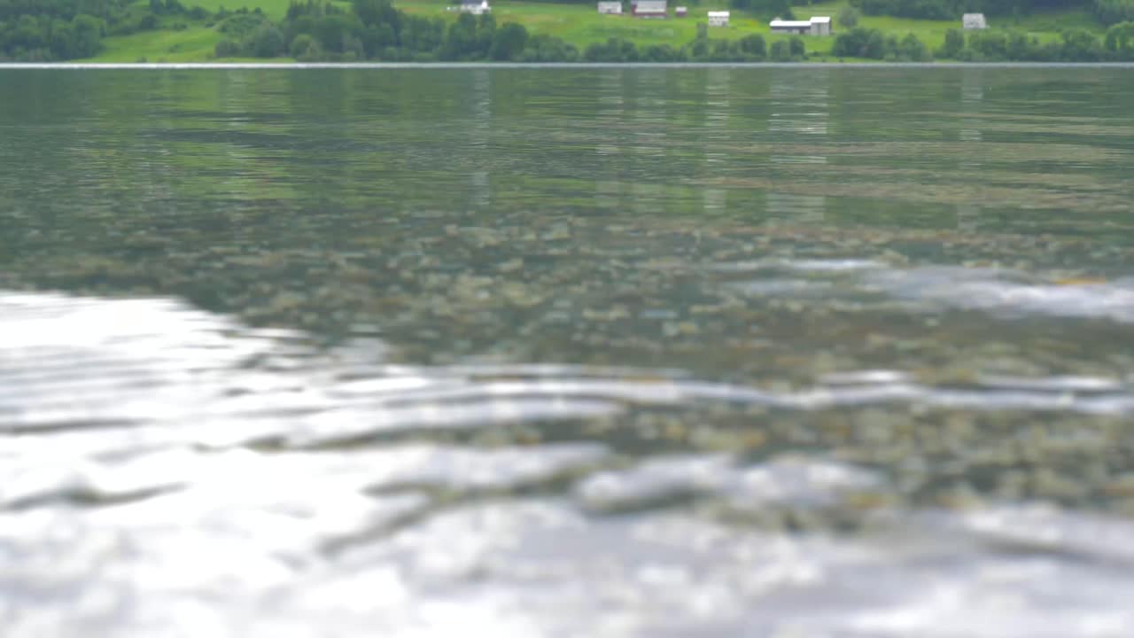 Crystal clear fjord water filmed near Alesund,  Norway.