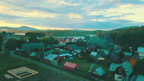 aerial view tourist city in the mountains on the sunset