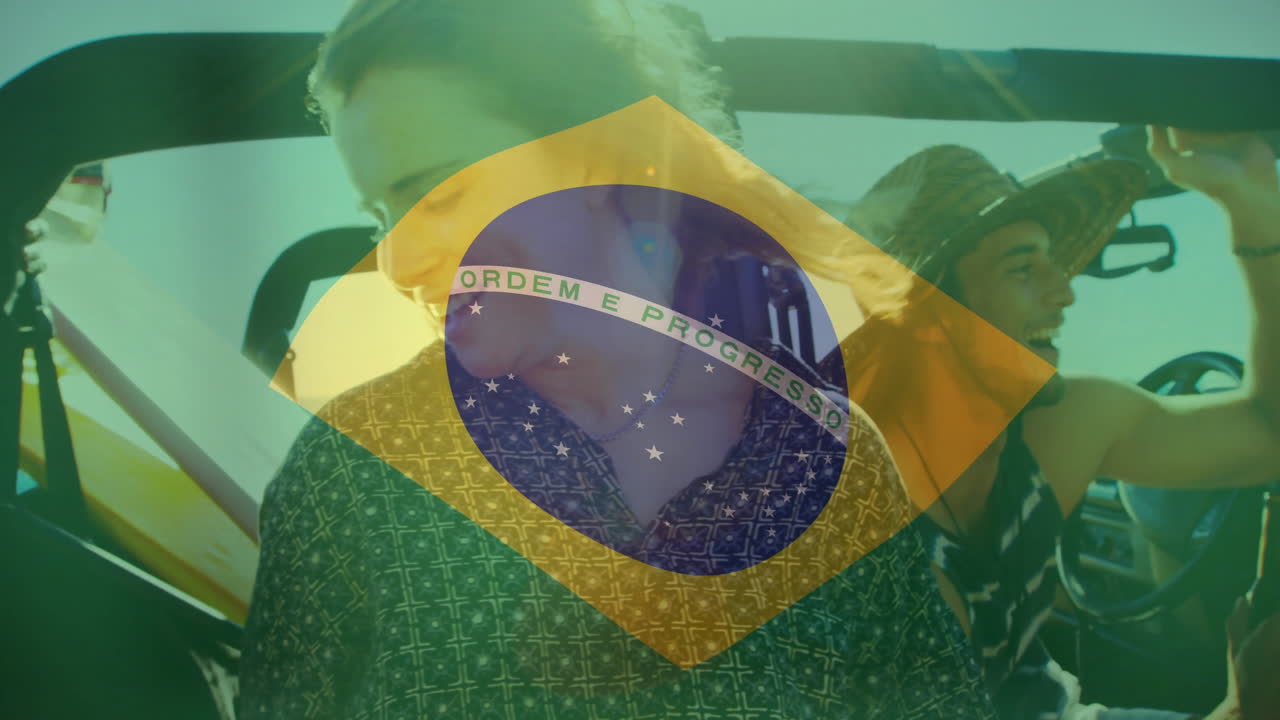 Holding Brazil flag, young people in car with animation overlay, smiling together