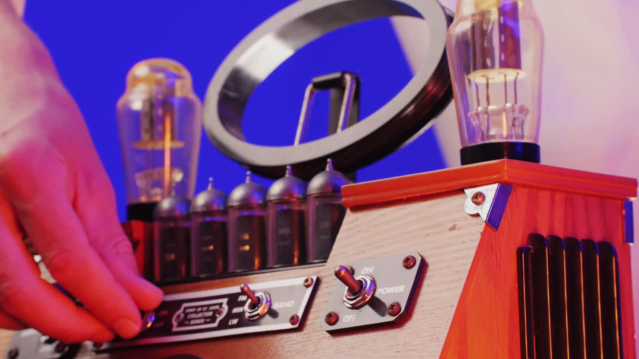 Old Retro AM FM Radio with tubes, Hand Changing stations , bulb vintage music player.