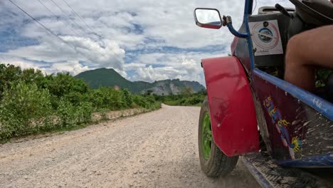 on a tropical buggy ride we go, past vegetation and dust that will blow