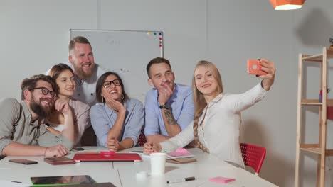 team selfie in modern office