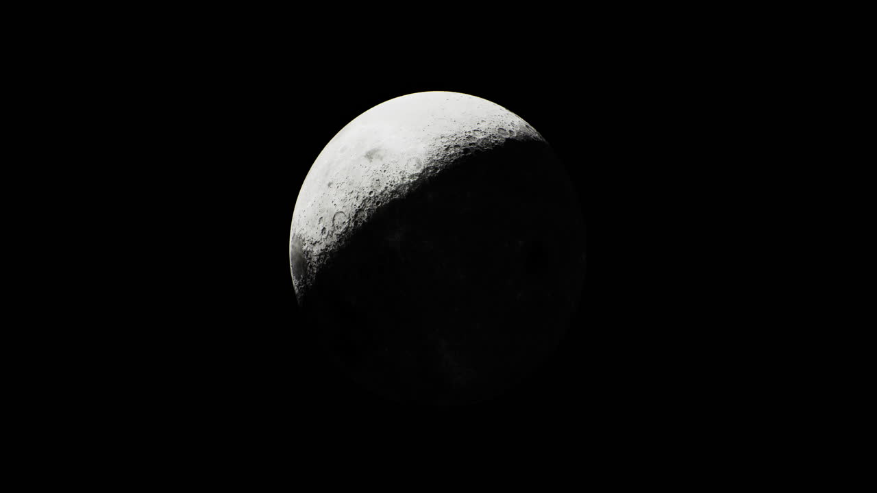 Majestic crescent moon glowing against a dark night sky viewed from earth