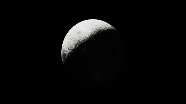 Lua crescente majestosa brilhando contra um céu noturno escuro vista da Terra