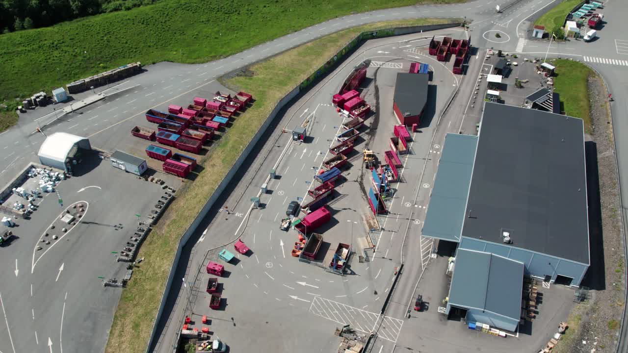 Aerial view of Molndal recycling center, trucks, sustainability concept