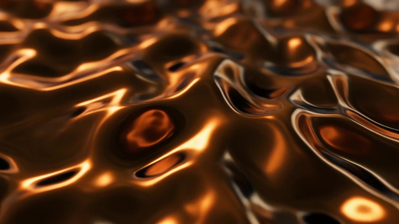 Superficie astratta d'oro liquido con onde increspate