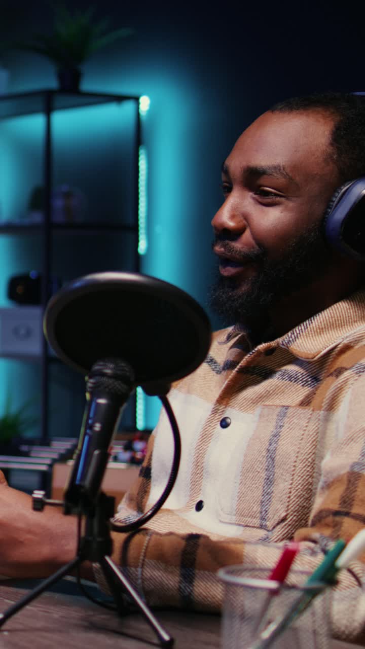 Vertical video Woman radio show presenter having live conversation with man, recording discussion for audience