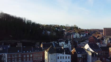 Scenic-aerial-view-over-historical-german-town-of-Stolberg,-Rhineland-with-surrounding-residential-buildings