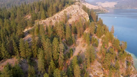 turquoise water and white rocks on the shore of kalamalka lake in the okanagan