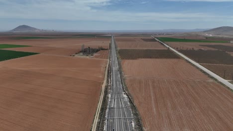 Overhead-view-from-the-agricultural-land-and-dirt-road-between-the-valley