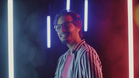 stylish man in neon lights