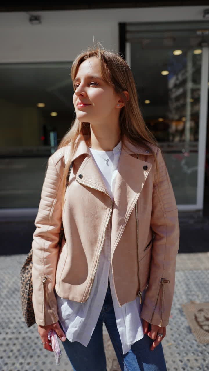 Young Woman in a Pink Leather Jacket