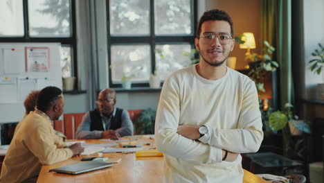 portrait of young immigrant student in language school classroom