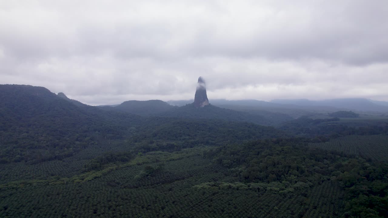 Pico Cão Grande, São Tomé — a dramatic volcanic plug rising from lush rainforest in Obô Natural Park, an iconic African landmark