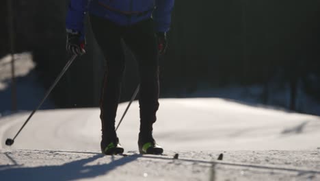 Slowmotion-of-a-skiers-skis-on-the-ski-track