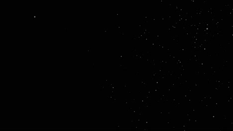 animation of snow particles falling across the screen on a black background