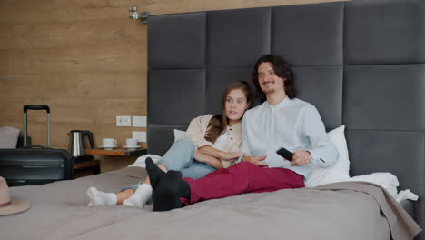 couple relaxing in hotel room