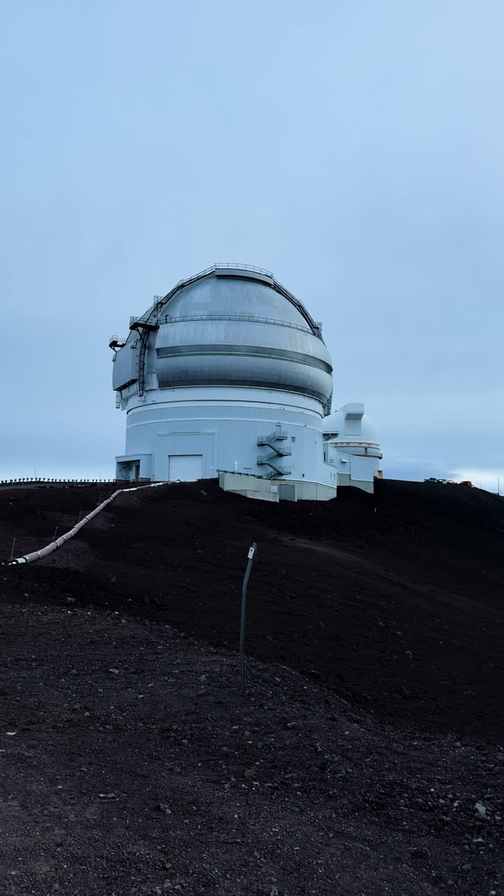 Panoramic View of Astronomical Observatories on a Volcanic Mountain at Twilight