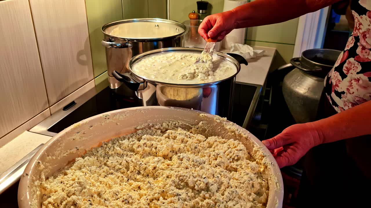 Traditional homemade cheese preparation in Cēsis, Latvia, showing local food culture and craft