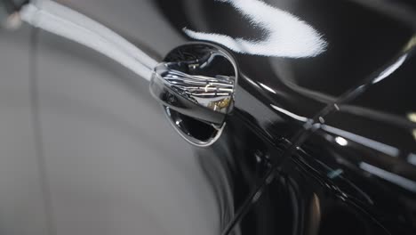 close-up of a black car's door handle