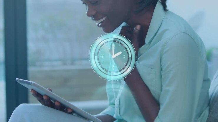 Animation of scope scanning and clock over african american businesswoman using tablet