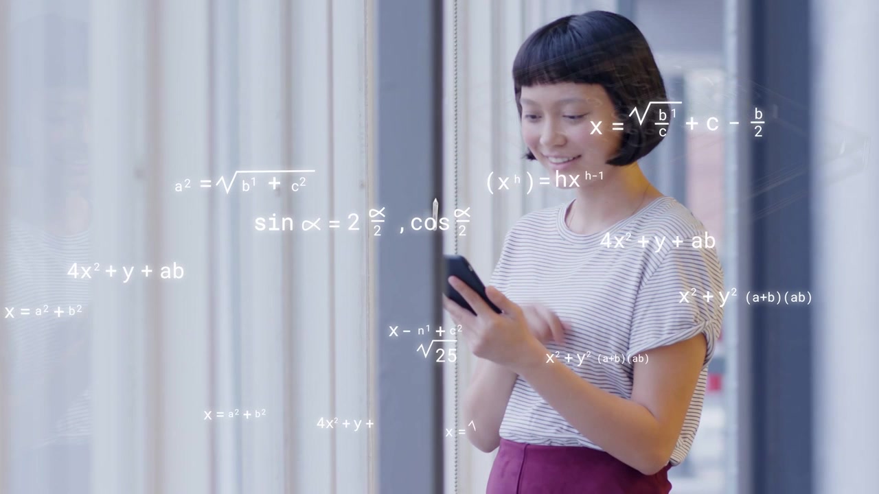 Woman standing by window retrieving phone and tapping, activating math overlays for tech insight
