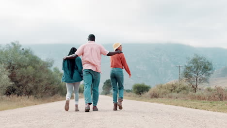 friends walking down a road together