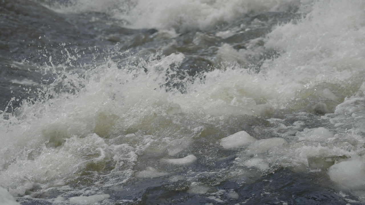 River Stream Flowing Crashed Through Floating Ice At Winter In Quebec, Canada