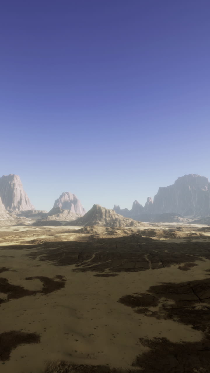 Expansive desert landscape showcasing towering rock formations at sunset