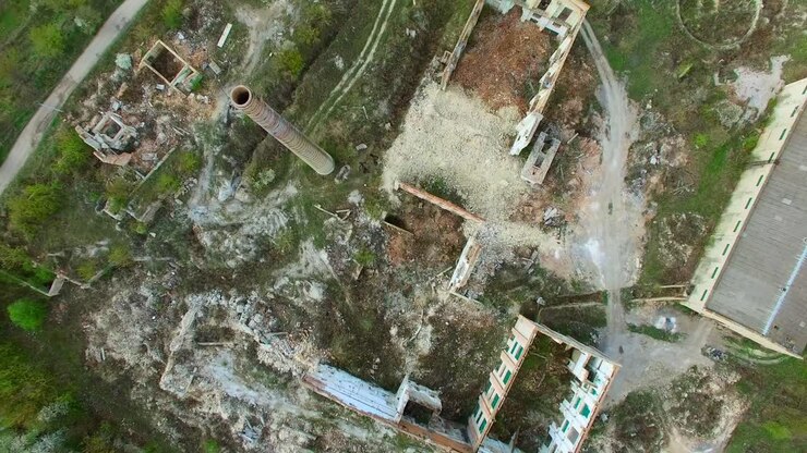 Aerial view of a destroyed factory. Remains of buildings 04