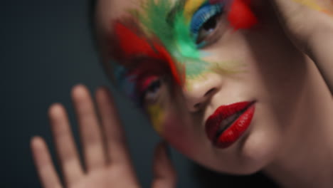 close up portrait attractive woman wearing colorful face paint exotic multicolored body art sensual female enjoying creative expression