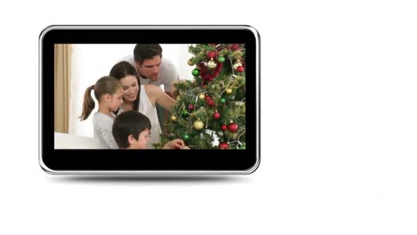 montaje de niños felices decorando el árbol de navidad