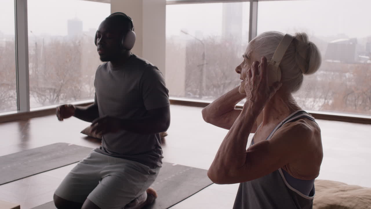 Yoga Session with Instructor and Senior Student