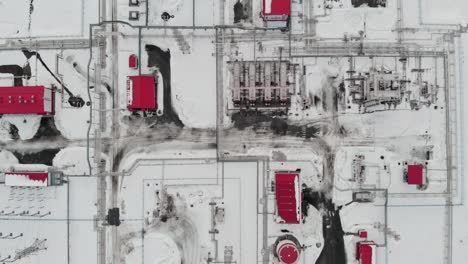 drone view of the winter industrial complex for preliminary preparation and cleaning of oil. oil and gas industry in harsh winter conditions. oil and gas production in russia and canada.