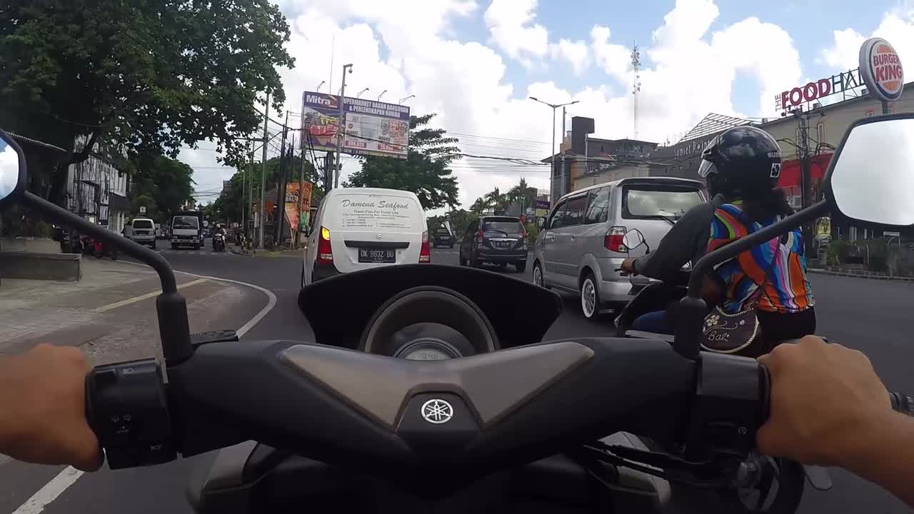 Road traffic from the point of view of a motorcycle rider