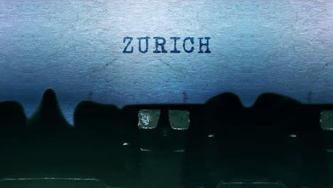 zurich word closeup being typing and centered on a sheet of paper on old vintage typewriter