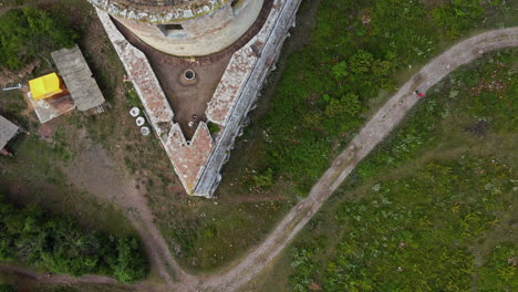 drone flying above the ruins of the ancient borgholm castle in oland, sweden - aerial