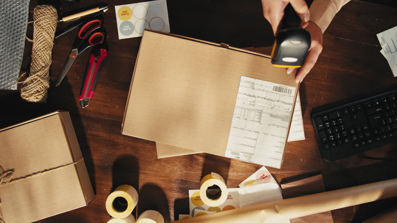 E-commerce storage shop, woman packing goods and clothes for second hand delivery market, dedicated Packaging and Shipping Workspace with Supplies and Technology for efficiency, online sales.