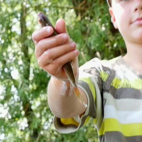 boy fishing and water drops
