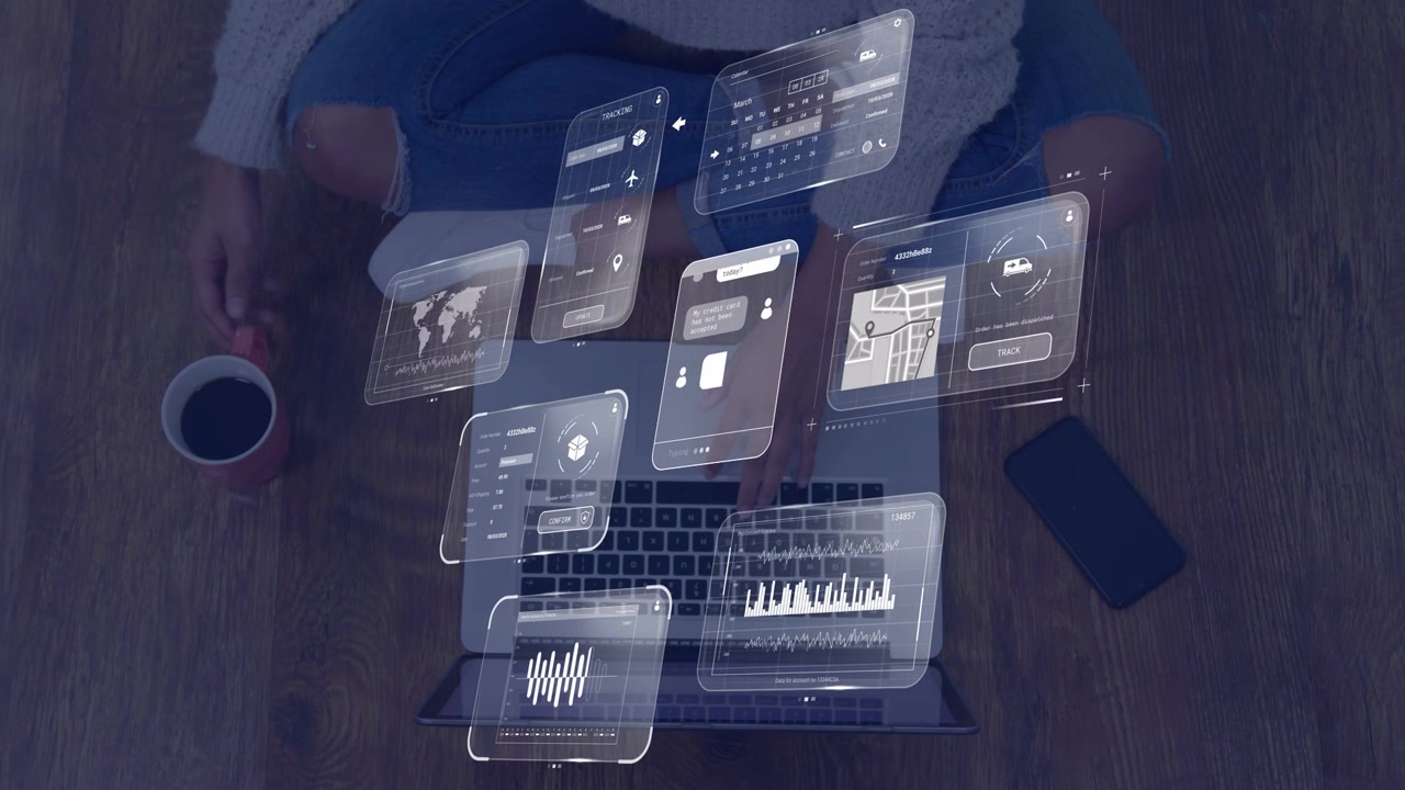 Woman typing on laptop for tech work, initiating floating UI panels, updating charts, mug nearby