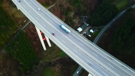 a bird's eye view of cars and trucks on talbrücke nuttlar during golden hour