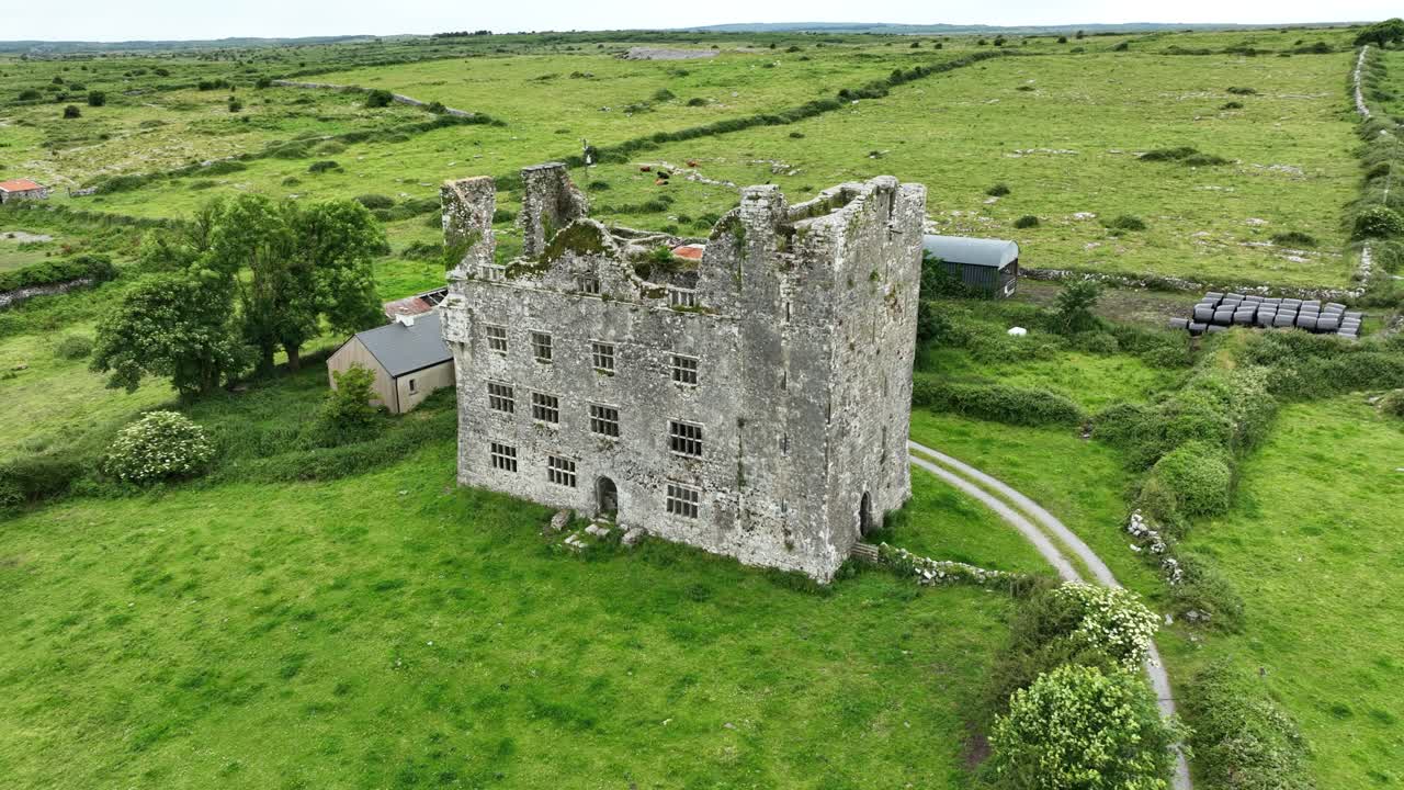 Irish Castles drone pullback of impressive ruins of Leamenah castle Co.Clare on the wild Atlantic way local landmark and tourist attraction