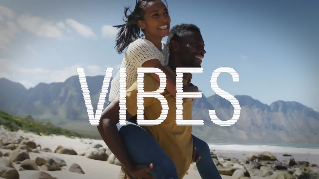 Animation af ordet "vibes" skrevet i hvidt over et glad par, der bærer hinanden på ryggen i bjergene