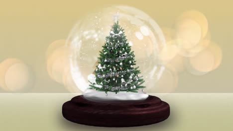 Animation-of-snowball-globe-with-christmas-tree-over-christmas-lights