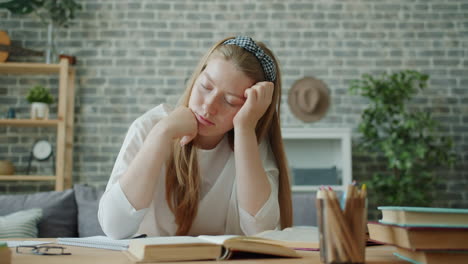 teenage girl stressed while studying