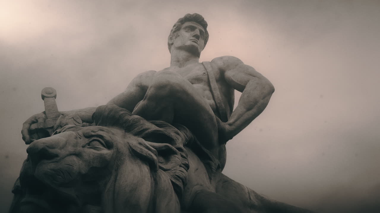 Epic, ancient stone statue on cloudy day and windy weather.